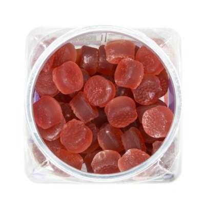 Red melatonin gummies - stock photo