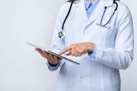 Doctor on a computer