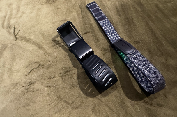 The Whoop is a lot chunkier and bulkier than the Fitbit Air (Alex Lee/The Independent )