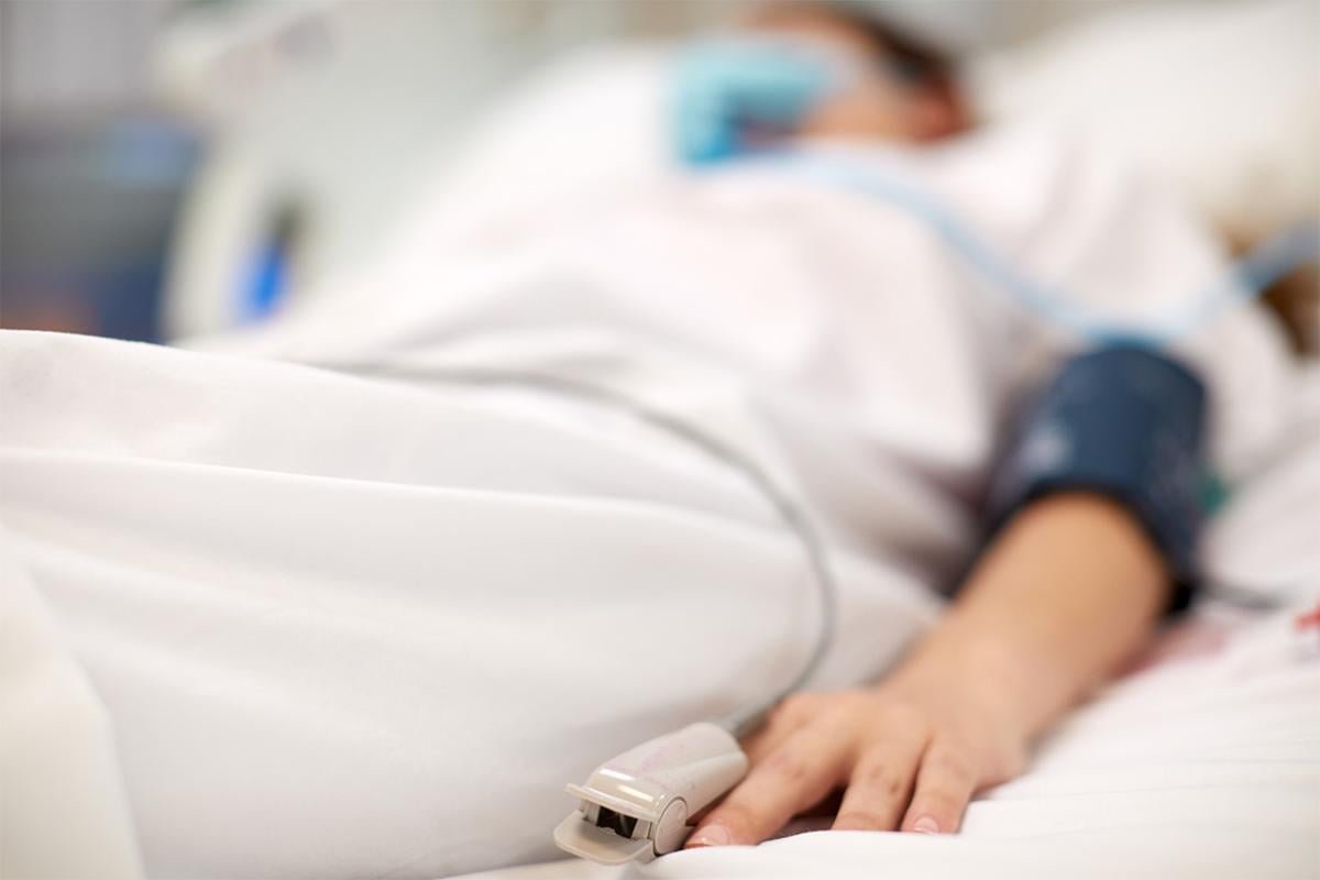 Patient in hospital bed