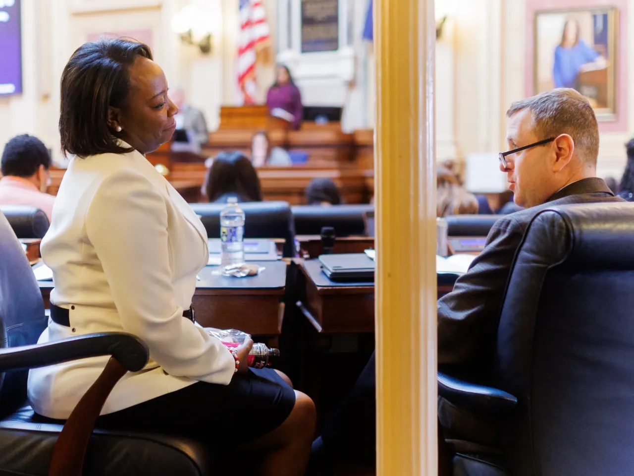 Del. Patrick Hope (right), D–Arlington, talks to Del. Stacey Carroll, D–Stafford, on Tuesday, February 3, 2026 at the Virginia State Capitol in Richmond.