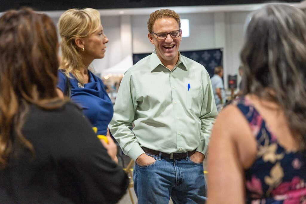 Dr. Evelyn Griffin and her husband, Dr. Joseph Griffin, speak to attendees at an alternative health wellness event in Mandeville