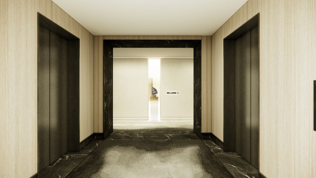 Signia Restore Elevator lobby with two closed elevators on either side and a hallway leading to a wellness area.