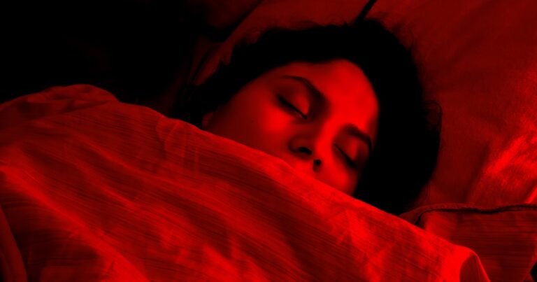 Your phone’s blue glow is keeping you up. Could red light be the fix?