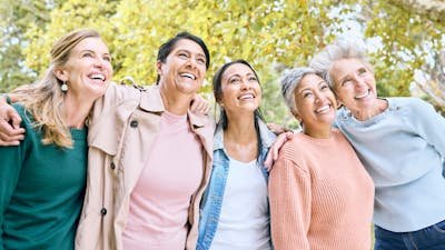 Senior women, people or bonding hug while bird watching in nature park, spring garden or relax envi.