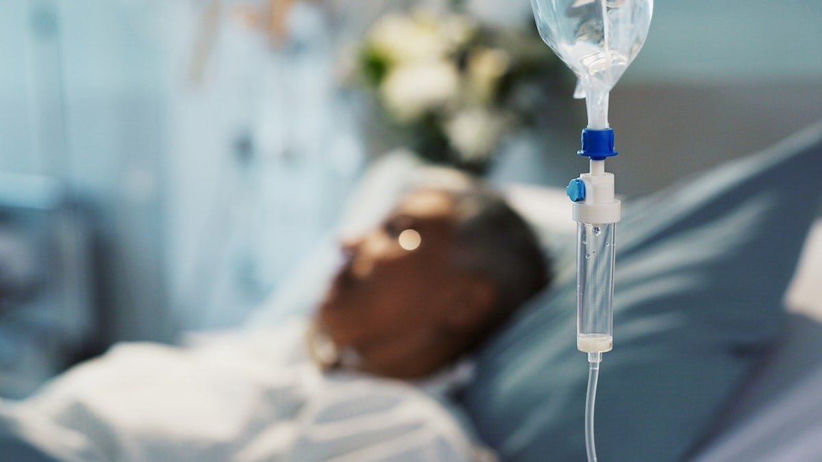 Person hospitalized with IV drip